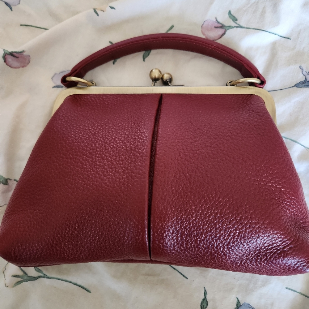 Red pebble leather frame crossbody bag
